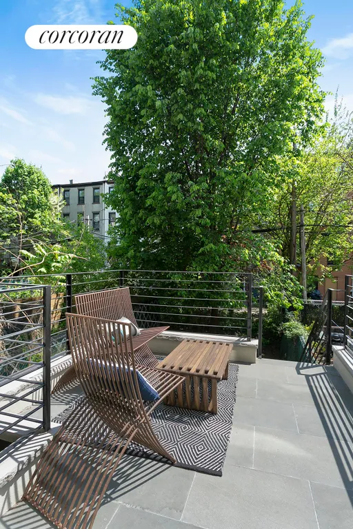 New York City Real Estate | View 194 MacDonough Street | Slate Terrace Overlooking Garden | View 4