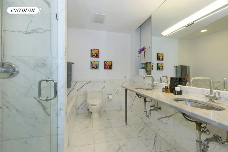 New York City Real Estate | View 224 West 18th Street, 2A | Marble bathroom | View 5