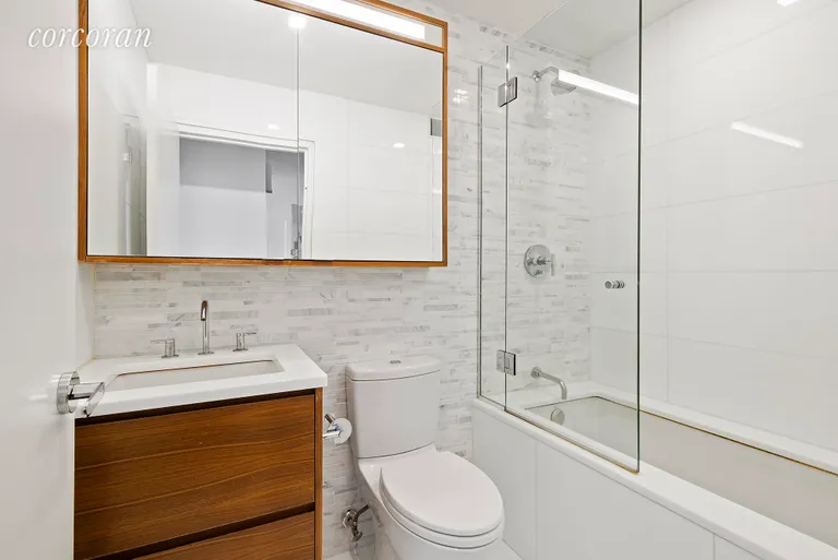 New York City Real Estate | View 301 West 53rd Street, 17H | Lots of storage in the bathroom | View 4