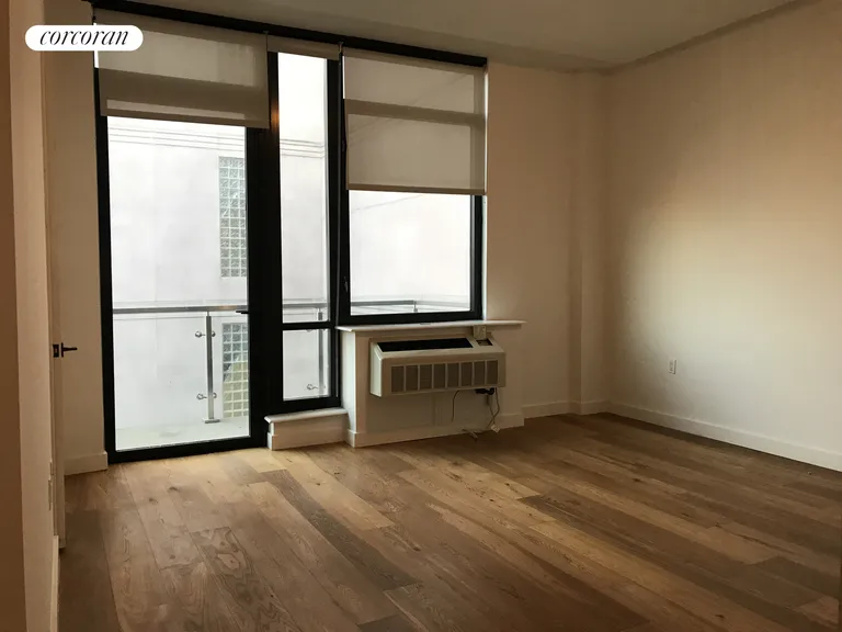 New York City Real Estate | View 180 Nassau Street, 10C | Master Bedroom with Private Balcony | View 5