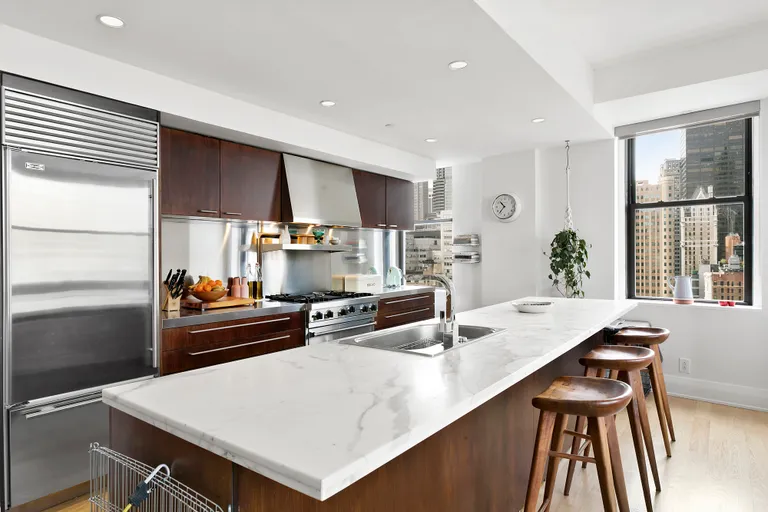 New York City Real Estate | View 150 Nassau Street, 19A | Windowed Chef's Boffi kitchen w/ a center island  | View 3