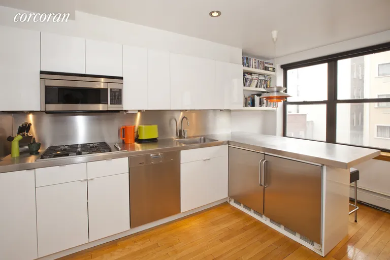 New York City Real Estate | View 133 Essex Street, 503 | Open kitchen with breakfast bar | View 2
