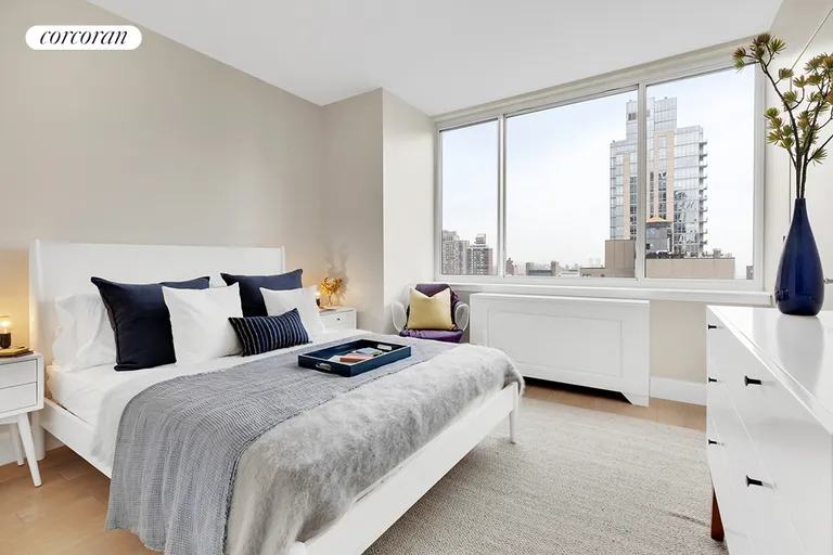 New York City Real Estate | View 389 East 89th Street, 23C | North facing second bedroom with city views | View 4