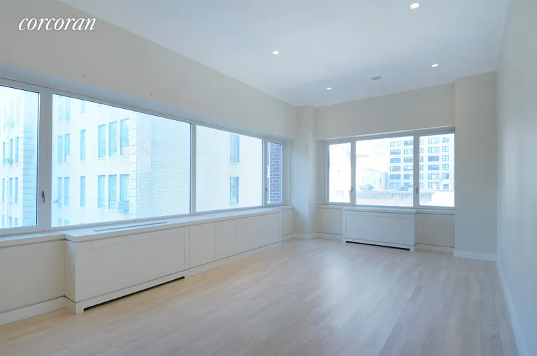 New York City Real Estate | View 322 West 57th Street, 15D | Corner Living Room | View 2