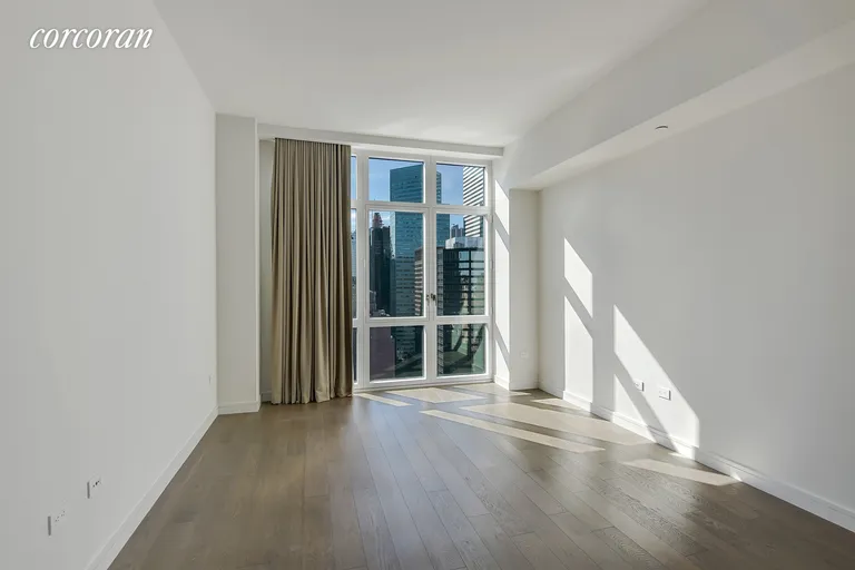 New York City Real Estate | View 305 East 51st Street, 29B | Huge Bedroom w/ Floor to Ceiling Windows | View 3