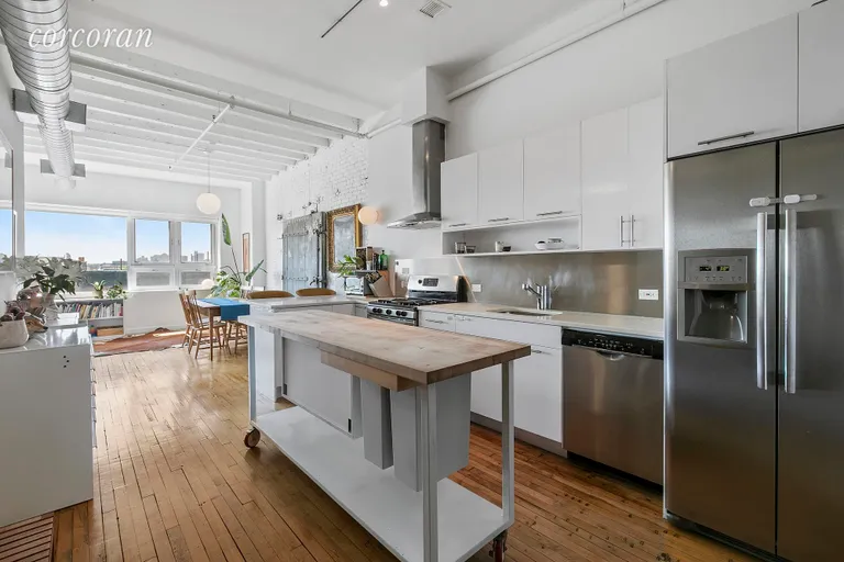 New York City Real Estate | View 95 Lexington Avenue, 5B | Open spacious kitchen with a hood that vents out | View 4