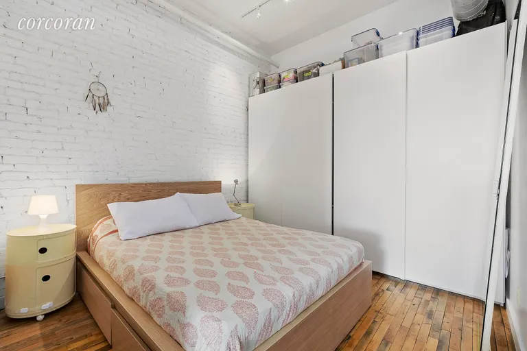 New York City Real Estate | View 95 Lexington Avenue, 5B | Master bedroom with exposed brick and closets | View 6