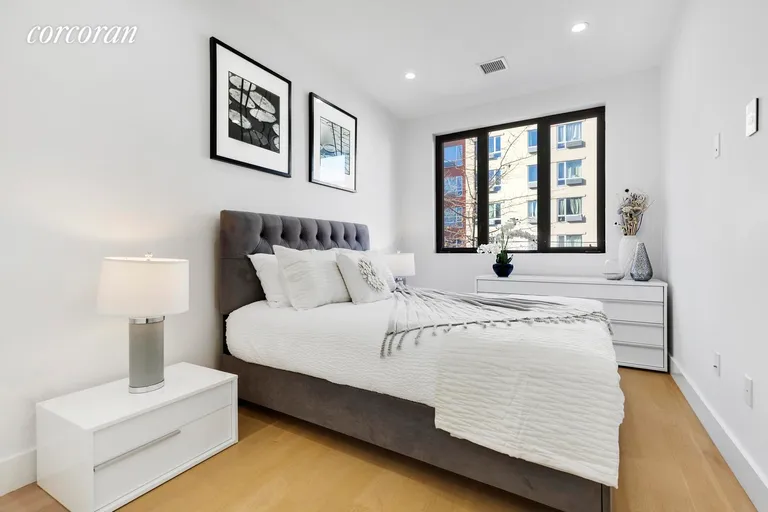 New York City Real Estate | View 149 Clifton Place, 3 | Garden Facing Bedroom | View 4