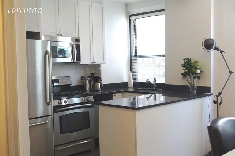 New York City Real Estate | View 162 West 56th Street, 1206 | renovated kitchen | View 2