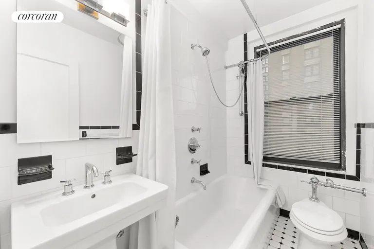 New York City Real Estate | View 162 West 56th Street, 1206 | Windowed Bathroom with large tub | View 5