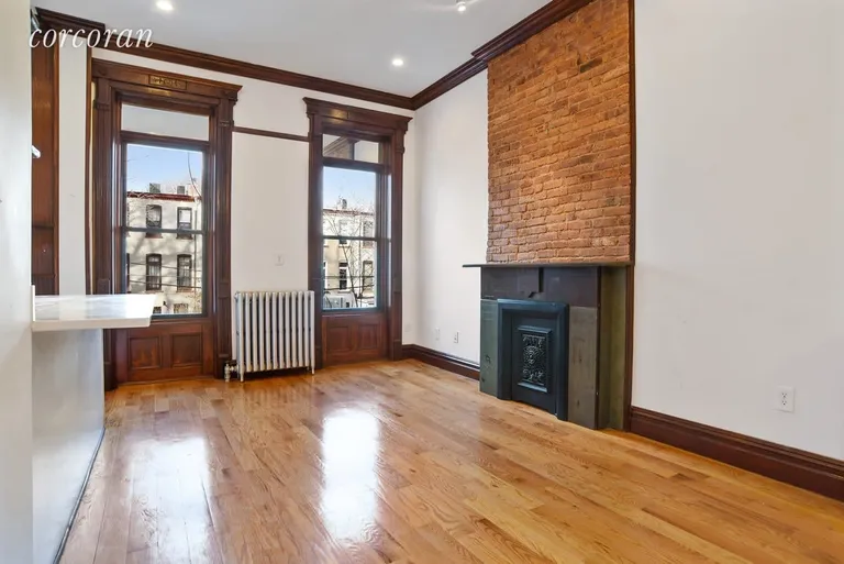 New York City Real Estate | View 697 Jefferson Avenue | Restored original fireplaces on the parlor level | View 5