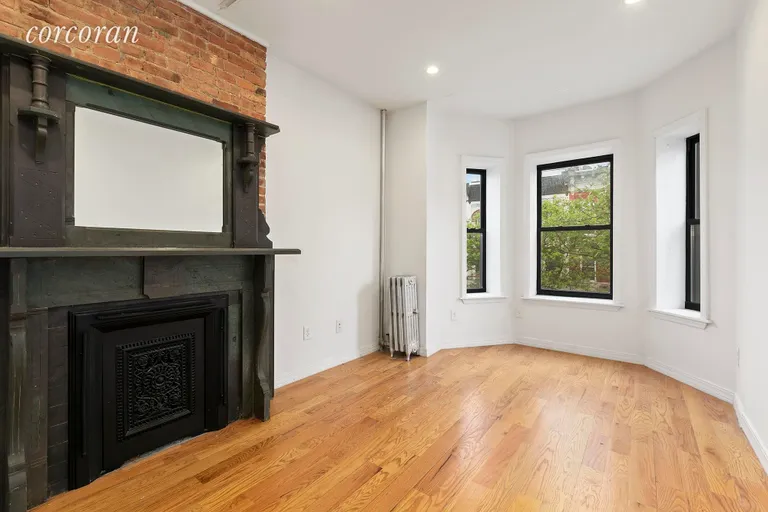 New York City Real Estate | View 697 Jefferson Avenue | 3rd floor bedroom with original fireplace! | View 11