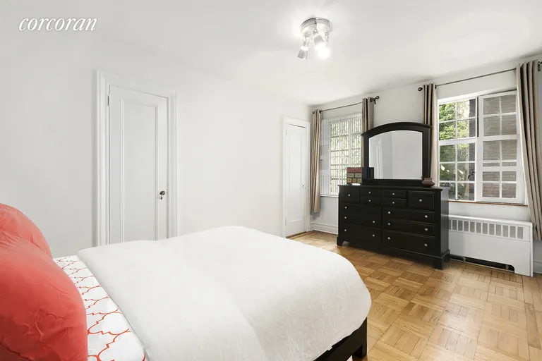 New York City Real Estate | View 116 Pinehurst Avenue, H21 | Second bedroom with glimpses of the Hudson | View 4