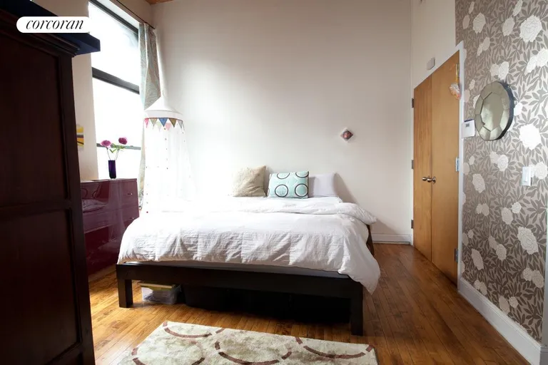 New York City Real Estate | View 138 Broadway, 2C | Large Sun-Drenched Bedroom | View 5