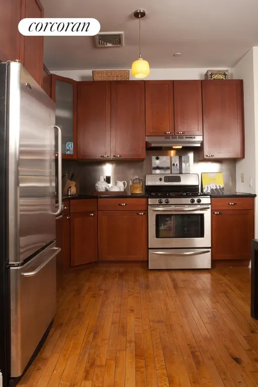 New York City Real Estate | View 138 Broadway, 2C | Stainless Steel Appliances and Hardwood Floors | View 6