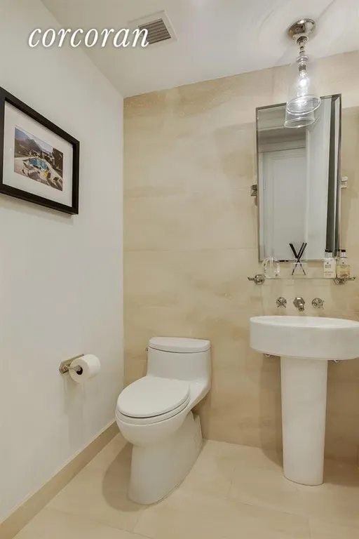 New York City Real Estate | View 200 East 79th Street, 6A | Powder Room | View 8
