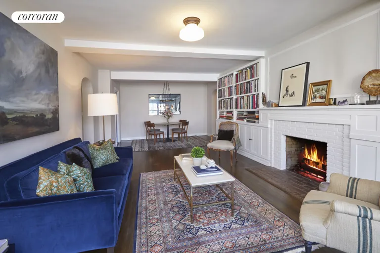 New York City Real Estate | View 140 East 28th Street, 10D | Living room with WBFP | View 9