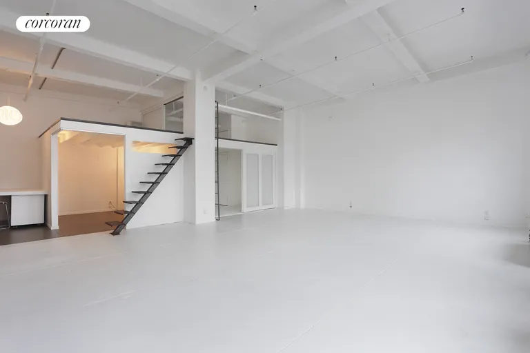 New York City Real Estate | View 448 West 37th Street, PHB | Wide mezzanine | View 4