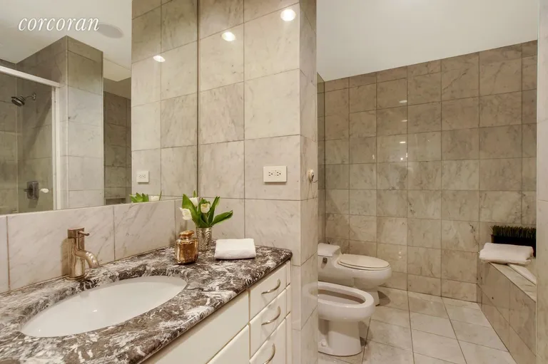 New York City Real Estate | View 146 West 57th Street, 39B | En suite Master Bath | View 3