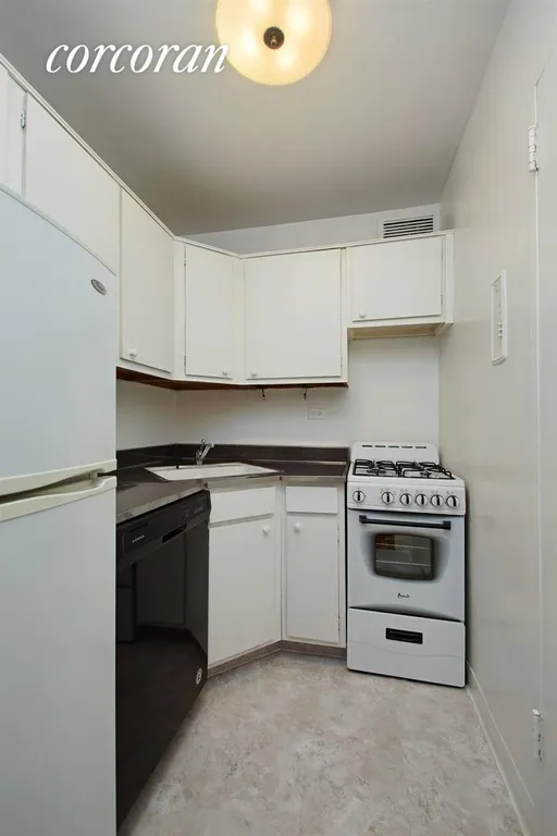 New York City Real Estate | View 330 East 49th Street, 10B | Kitchen with updated appliances | View 5