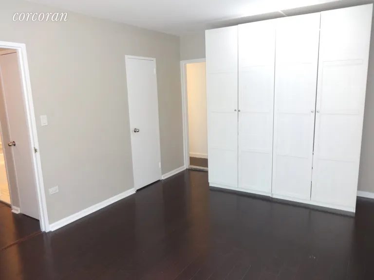 New York City Real Estate | View 122 Ashland Place, 4M | Master Bedroom w/2 closets and storage cabinets | View 11