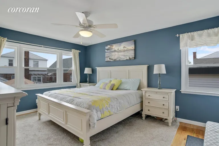 New York City Real Estate | View 562 Beach 132nd Street | Master Bedroom with master bathroom | View 5