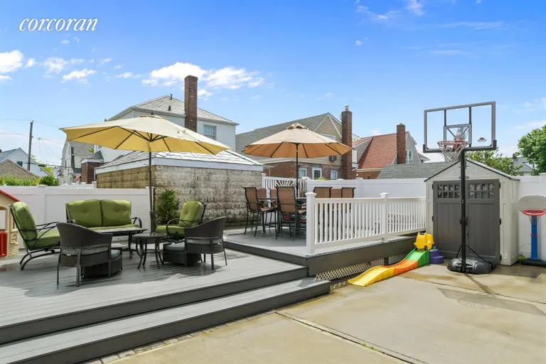 New York City Real Estate | View 562 Beach 132nd Street | Large backyard with more views | View 9