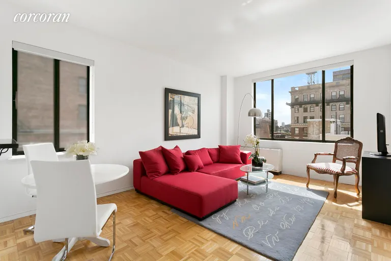 New York City Real Estate | View 77 Bleecker Street, 1215 | Large living room with dining area. | View 2