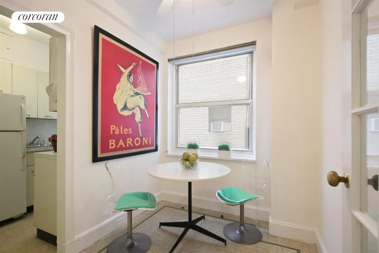New York City Real Estate | View 240 East 79th Street, 11B | Dining area with large window | View 5