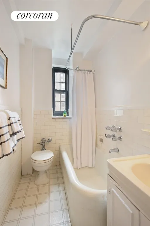 New York City Real Estate | View 240 East 79th Street, 11B | One of two windowed full bathrooms | View 9