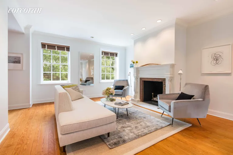 New York City Real Estate | View 36 Verandah Place | South facing living room with fireplace | View 4