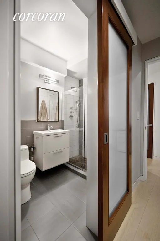 New York City Real Estate | View 20 East 35th Street, 7G | Beautifully Renovated Bath with En-Suite Access | View 8