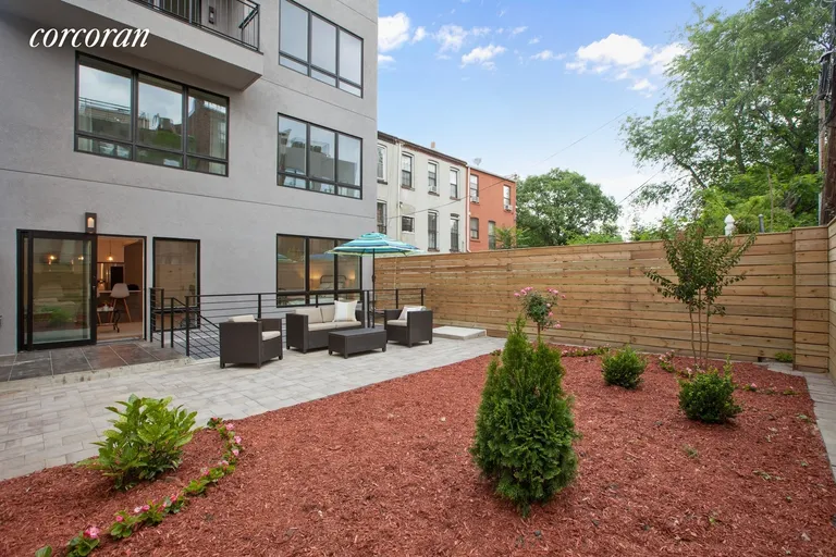New York City Real Estate | View 226 Hart Street, 1B | private backyard faces building | View 2