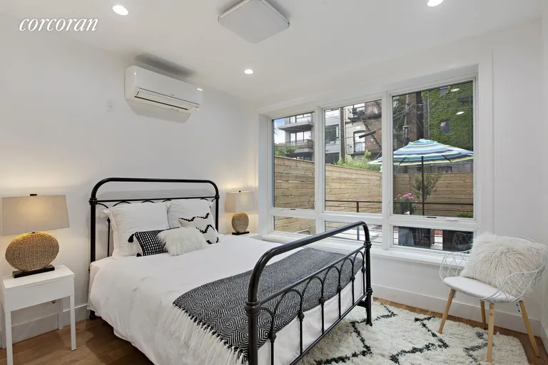 New York City Real Estate | View 226 Hart Street, 1B | bedroom with private backyard | View 4