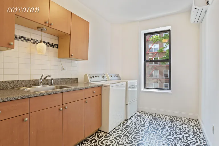 New York City Real Estate | View 295 East 7th Street | Top floor laundry room | View 8