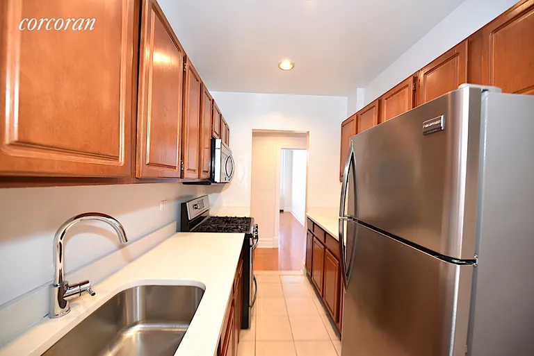 New York City Real Estate | View 45-02 Ditmars Boulevard, 204 | room 2 | View 3