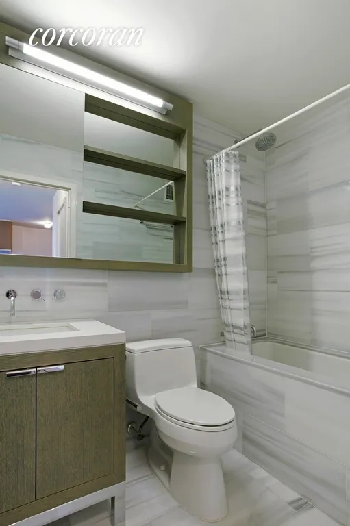 New York City Real Estate | View 225 Rector Place, 11H | Marble Bathroom | View 5