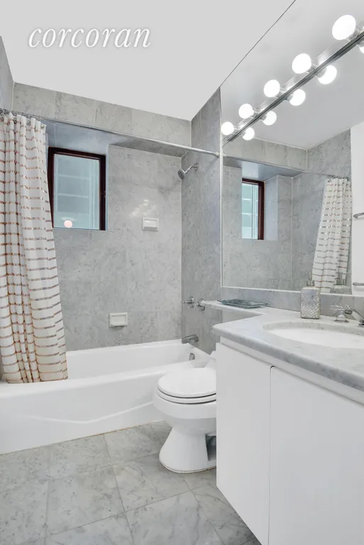 New York City Real Estate | View 45 East 25th Street, 12A | WINDOWED BATH IN WHITE MARBLE | View 5