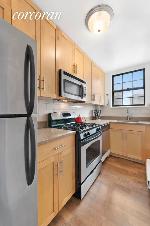 New York City Real Estate | View 225 East 36th Street, 17C | Day-dream at the sink!  | View 4