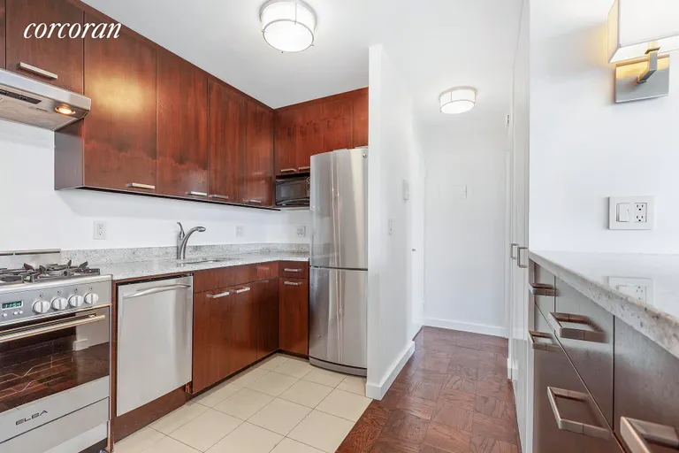 New York City Real Estate | View 353 East 72Nd Street, 8D | Open Kitchen with Breakfast Bar | View 2