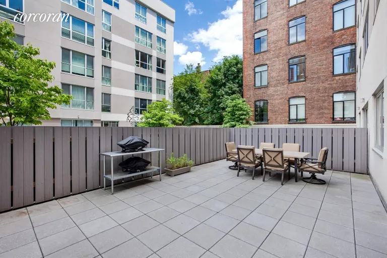 New York City Real Estate | View 125 North 10th Street, SGB | fully-furnished private garden patio with grill | View 9