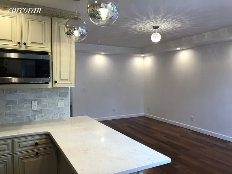 New York City Real Estate | View 44 Woodhull Street, 1 | View of Dining/Living Area w/ custom lights | View 2