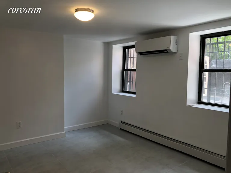 New York City Real Estate | View 44 Woodhull Street, 1 | 2nd Bedroom overlooking Private Garden | View 6