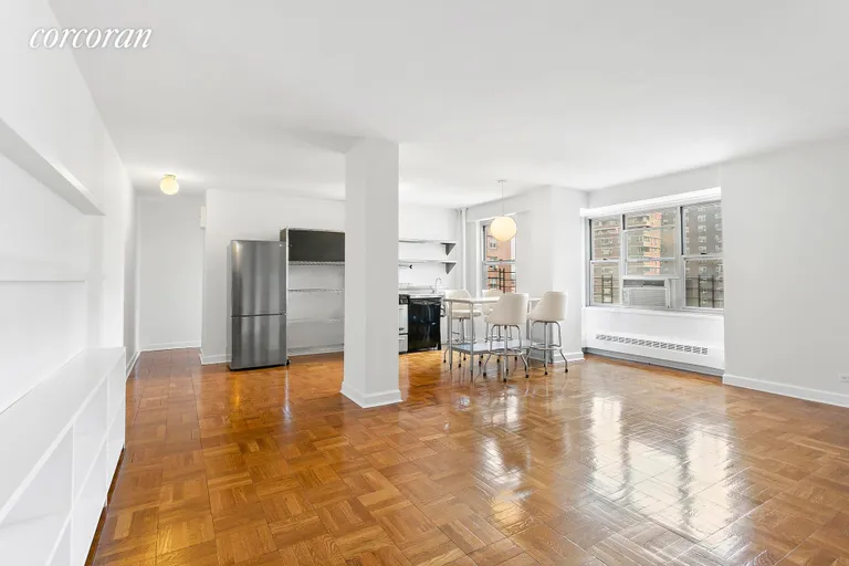 New York City Real Estate | View 573 Grand Street, D1302 | Living Room & Kitchen | View 2