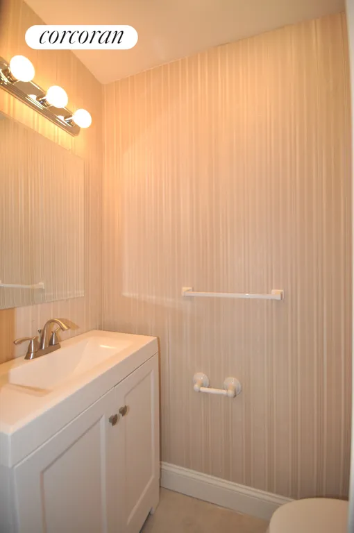 New York City Real Estate | View 1649 73rd Street | Powder Room | View 13