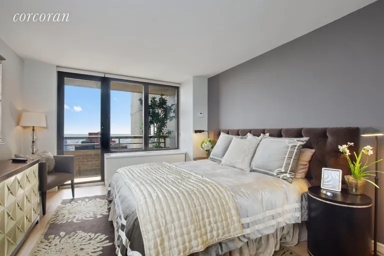 New York City Real Estate | View 330 East 38th Street, 49K | Master Bedroom with Balcony | View 4