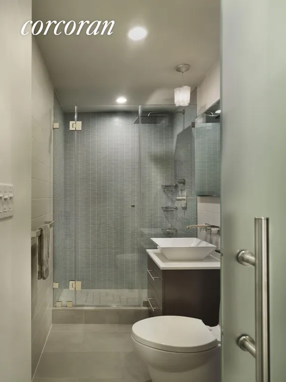 New York City Real Estate | View 350 BLEECKER STREET, 1C | Mint Bathroom | View 4