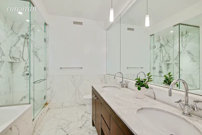 New York City Real Estate | View 230 West 56th Street, 52A | Spa-Like Master Bathroom | View 5