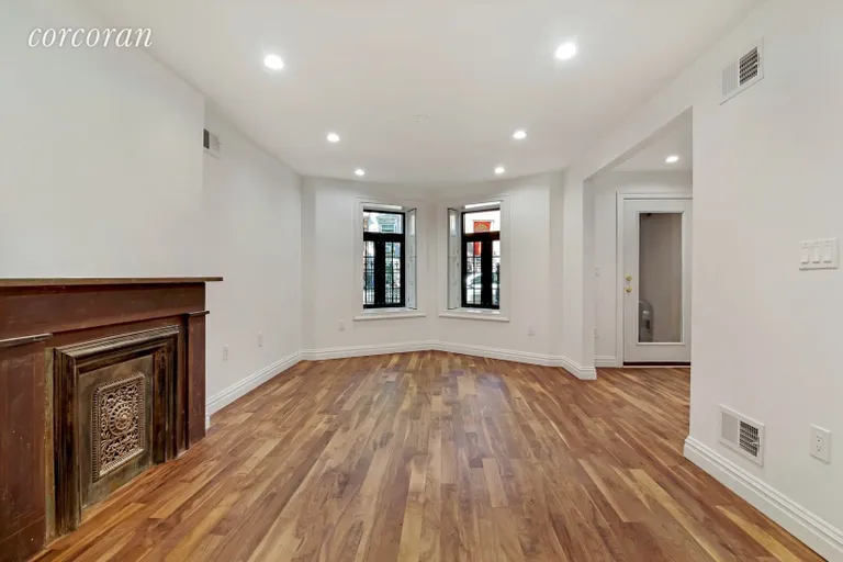 New York City Real Estate | View 282 Clifton Place, 1 | Master Bedroom with En Suite Bathroom  | View 6