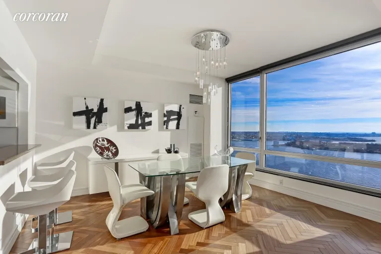 New York City Real Estate | View 10 West Street, 37G | Dining Room with Harbor Views | View 6